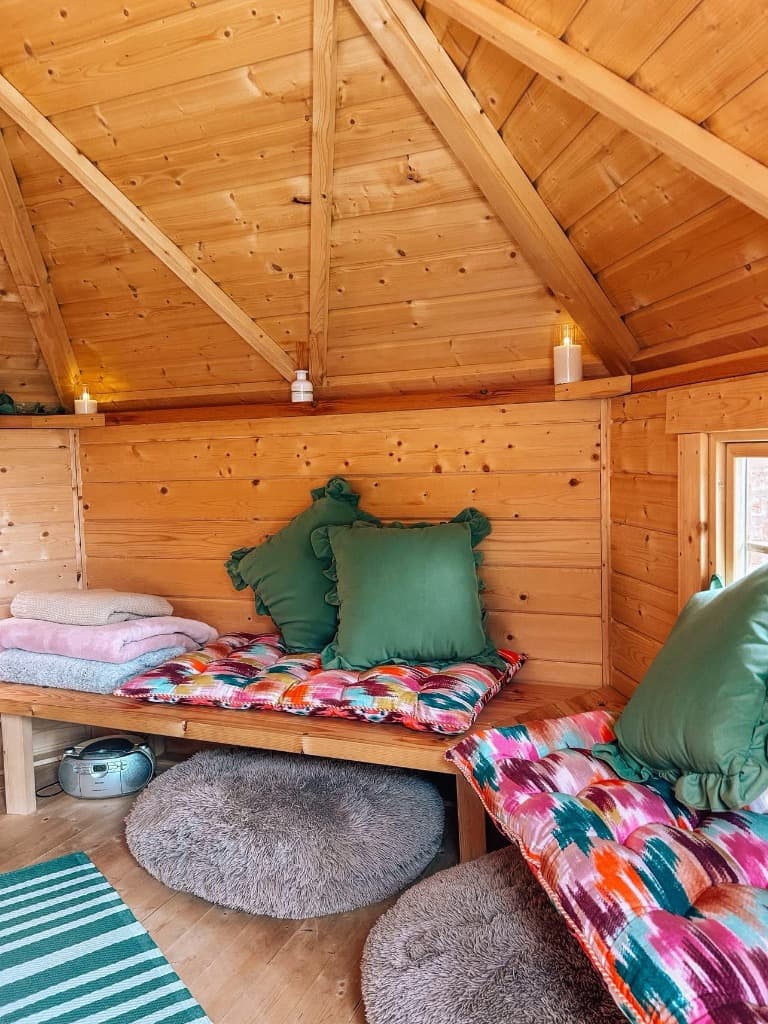 Inside the cosy wooden spa cabin